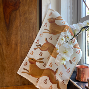 Hurrying Hares Tea Towel